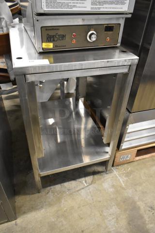 Stainless Steel Equipment Stand with under shelf, sturdy condition, smooth surface, ideal for kitchen or industrial use.