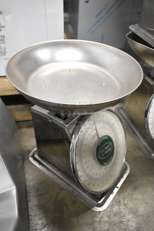 Two Universal AccuWeigh Yamaha SM(N) 30 lb countertop scales. Durable, good condition, with readable dials for accurate measurement.