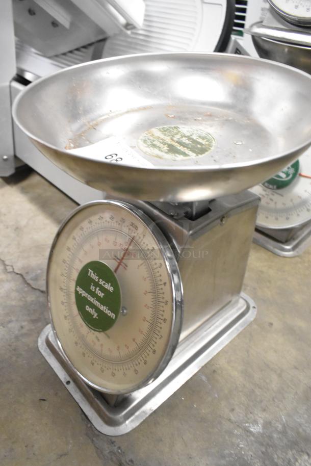 Two Universal AccuWeigh Yamaha SM(N) countertop scales, 30 lb capacity, stainless steel, note "for approximation only" label.