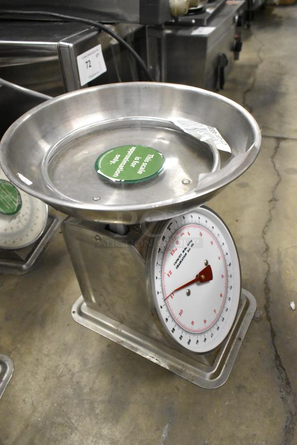 Marco SW10211 countertop scale, 30-pound capacity, stainless steel, dial with red pointer, "this scale is for approximation only" tag.