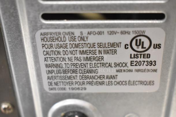 Metal countertop electric toaster oven label showing 120V, 1 phase, UL listed, and safety cautions. Model: AFO-001.