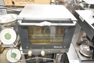 Cadco Unox Roberta XAF003 commercial countertop convection oven, stainless steel, electric, 120V, used condition, visible control knobs.