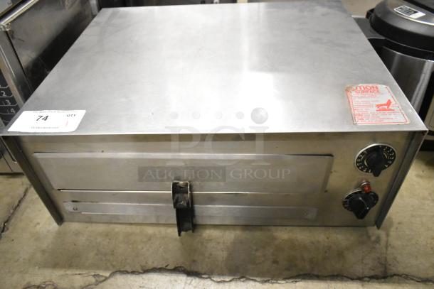 Wisco 560 stainless steel countertop pizza oven, electric 120V, 1 phase. Used condition, with control knobs and caution label.