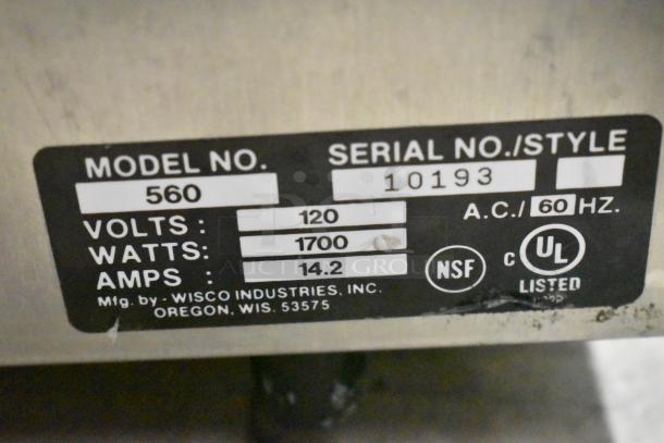Wisco 560 stainless steel countertop electric pizza oven label showing model, voltage, wattage, and safety certifications.