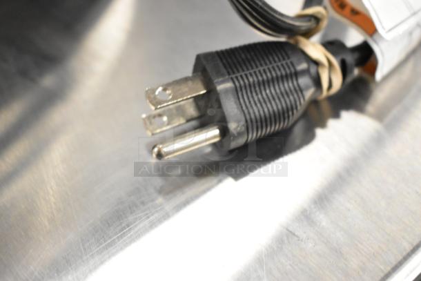 Close-up of an Instant Pot Lux 80's power plug. Features a two-prong plug suitable for 120 volts, 1 phase.