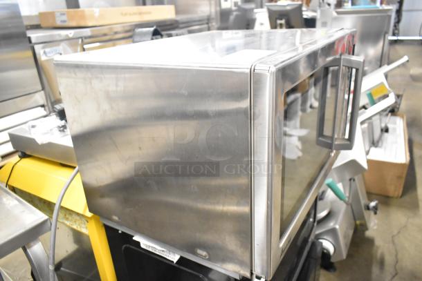 2019 Amana RCS10TS stainless steel commercial countertop microwave oven, 120 volts, 1 phase, minor wear visible.