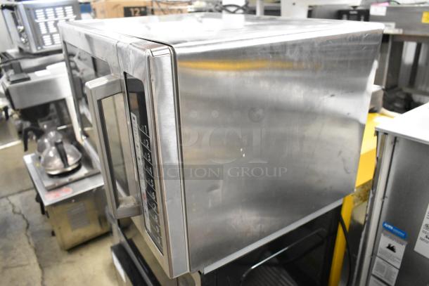 2019 Amana RCS10TS stainless steel commercial microwave, 120 volts, showing control panel, minor surface wear.