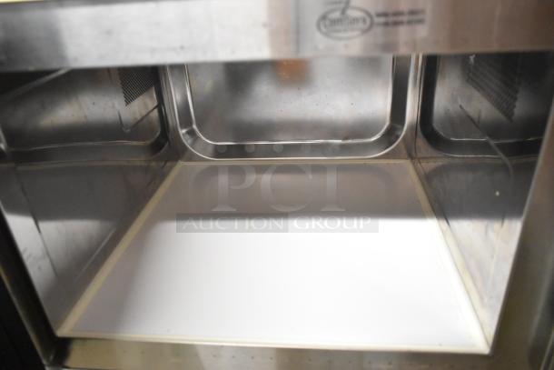 2019 Amana RCS10TS stainless steel commercial microwave, 120 volts, interior view, clean, slight wear visible.