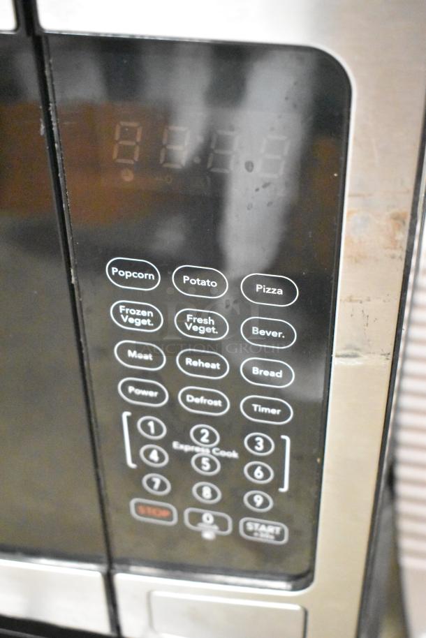 Frigidaire EMW1120-B-3ACOM stainless steel countertop microwave, digital keypad, multiple preset options, 120 Volts, 1 Phase.