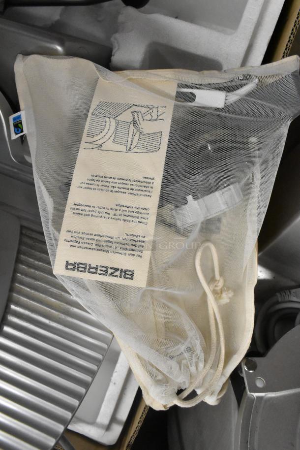 2018 Bizerba GSP H meat slicer, 120V/1 Phase, shown with power cord and manual in mesh bag. Clean condition.