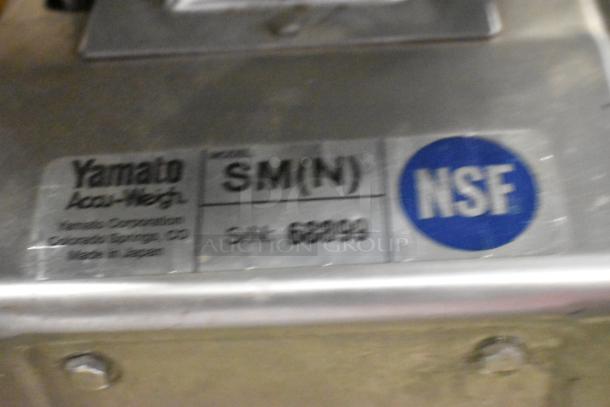 NSF-certified Yamaha AccuWeigh SM(N) scale label showing serial number 68099, made in Japan by Yamato Corporation.