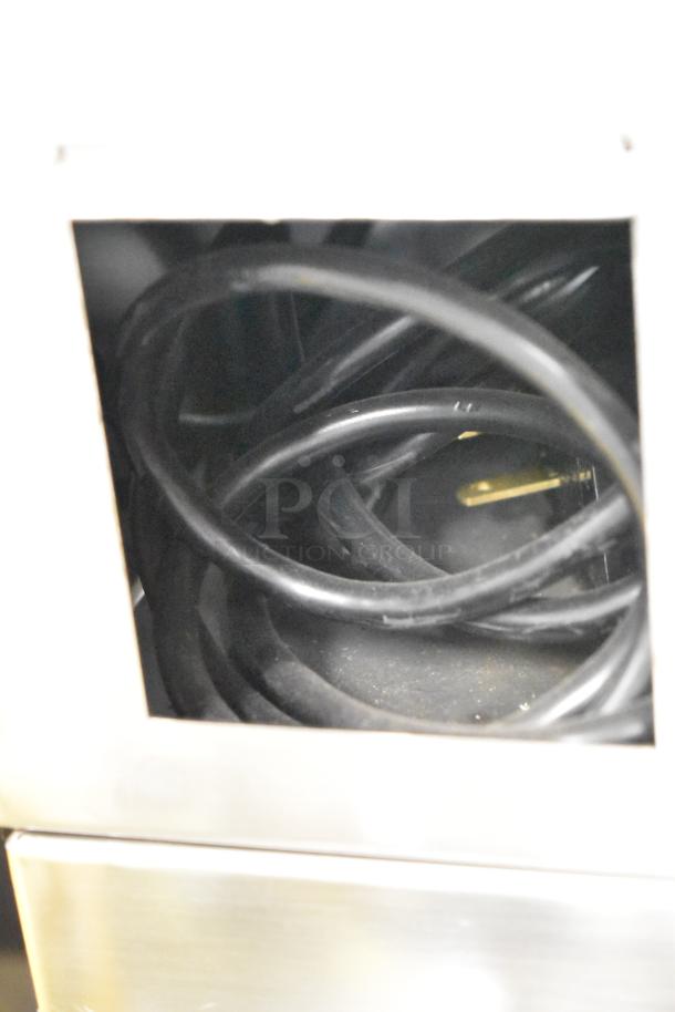Easy Hardware Hybrid 684 stainless steel portable sink with single bay, commercial casters; wires visible inside.