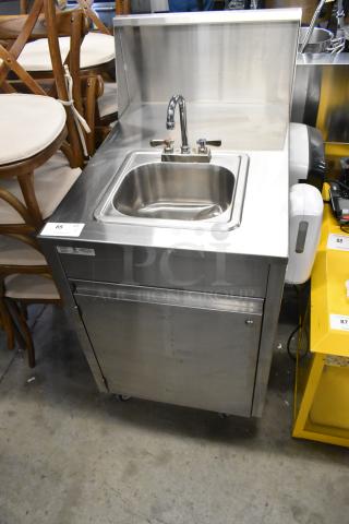QualServ WMSC24MS stainless steel portable sink, single bay, on casters. Features faucet and storage, commercial grade.