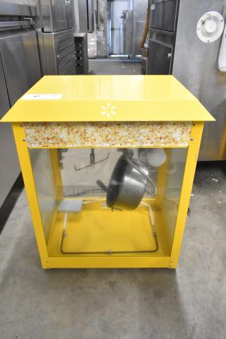 2019 OY-828 Metal Popcorn Machine; yellow countertop model, 110V, 1 phase. Features large glass viewing area and popcorn graphics.