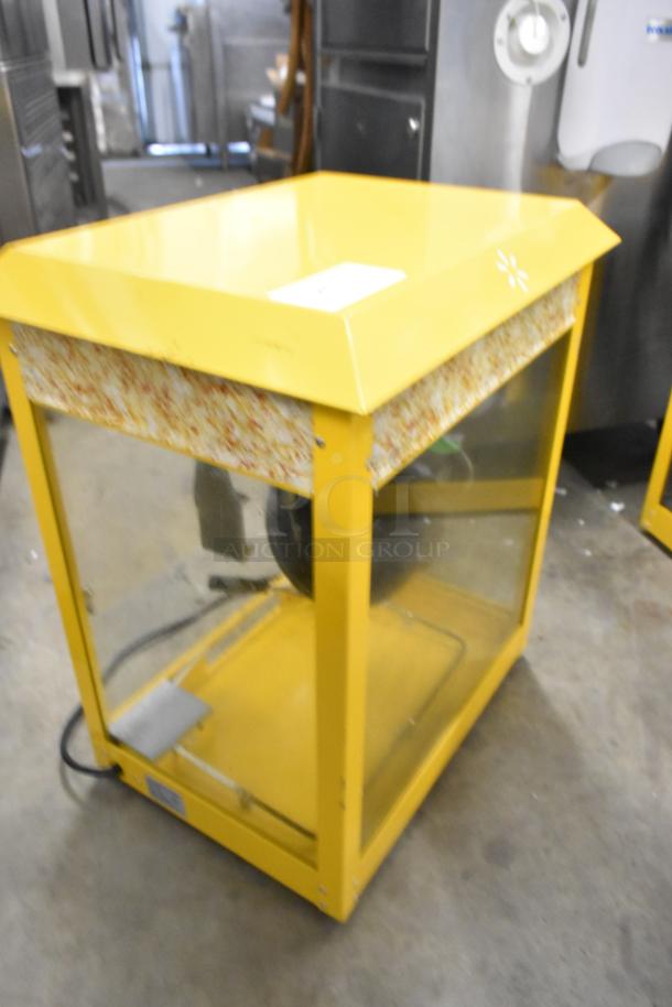 2019 OY-828 metal popcorn machine in yellow, countertop model. Features glass panels, 110V, 1 phase. Visible label.