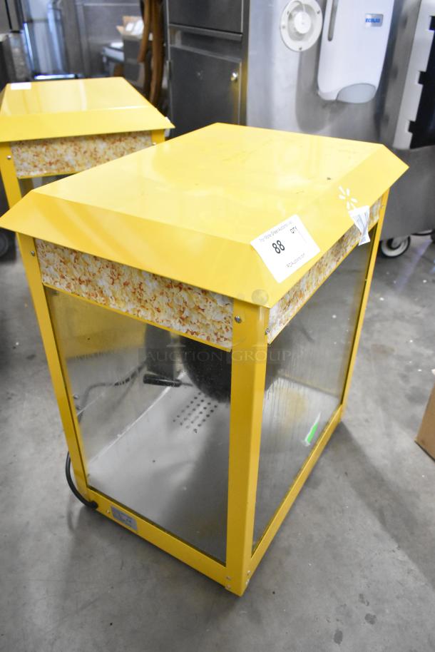 2019 OY-828 Metal Countertop Popcorn Machine, yellow, with popcorn graphic trim and visible power cord. 110 Volts, 1 Phase.