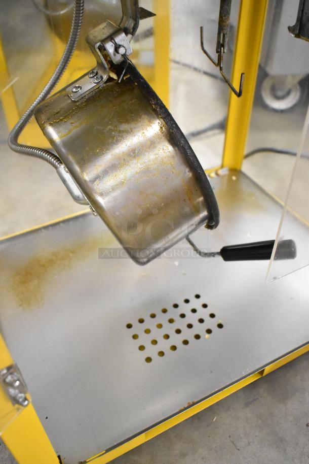2019 OY-828 Metal Countertop Popcorn Machine, shown in used condition, 110 Volts, 1 Phase. Features stainless steel components.