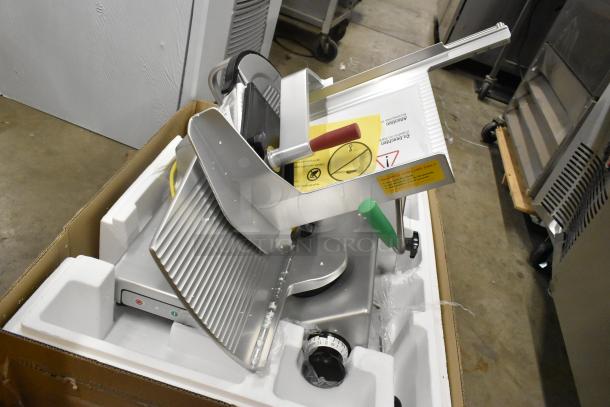 2024 Bizerba GSP H metal commercial meat slicer, 120V, 1 phase, new condition in packaging, visible sharpening label.