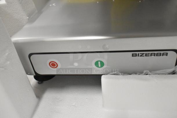 2024 Bizerba GSP H commercial meat slicer, stainless steel, 120 volts, 1 phase, close-up of control panel with on/off buttons.