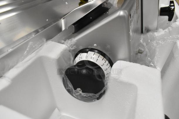 2024 Bizerba GSP H metal commercial countertop meat slicer, featuring a knob with precision settings. New condition.