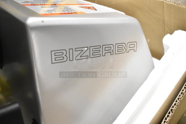 2024 Bizerba GSP H metal commercial countertop meat slicer, 120V, 1 phase. New condition in packaging. Visible Bizerba logo.