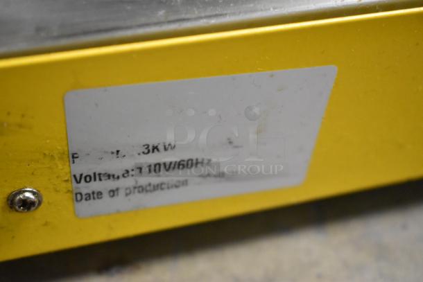 2019 OY-828 Metal Popcorn Machine label showing 110V/60Hz, yellow frame, slight wear.