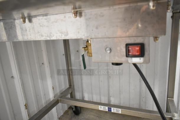 Belshaw Adamatic H&I stainless steel glazing station, commercial floor style, with casters, red switch, and certification labels.