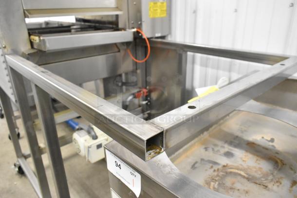Belshaw TG50 stainless steel thermoglazing station, commercial floor style, on casters, 208V, 1 phase, showing some wear.
