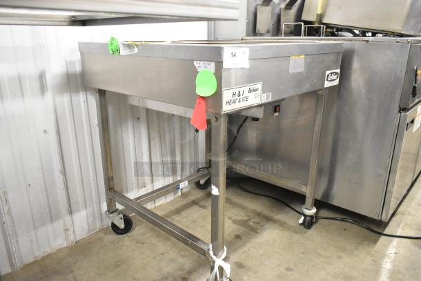 Belshaw Adamatic H&I-4 stainless steel glazing station, commercial casters, 208-240V, 1 Phase, good condition.