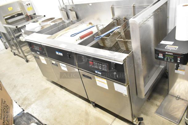 Giles EOF-24 stainless steel 2-bay electric deep fat fryer with center dumping station on casters, 480V, 3-phase.