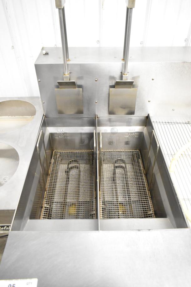 Giles EOF-24 stainless steel commercial electric 2 bay deep fat fryer with center dumping station on casters, 480V, 3 phase.