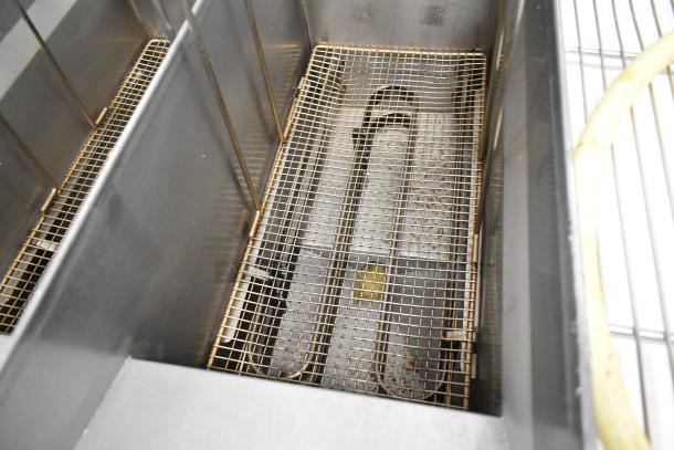 Giles EOF-24 stainless steel 2-bay electric deep fat fryer with center dumping station, on casters, 480V, 3-phase.