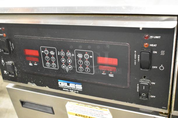 Giles EOF-24 stainless steel 2-bay deep fat fryer with center dumping station, commercial casters, 480V 3-phase.