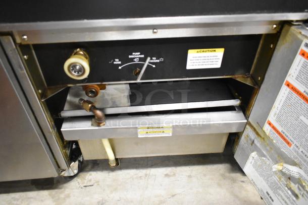 Giles EOF-24 stainless steel electric deep fat fryer, two bays, center dumping, on casters, 480V, 3 phase.