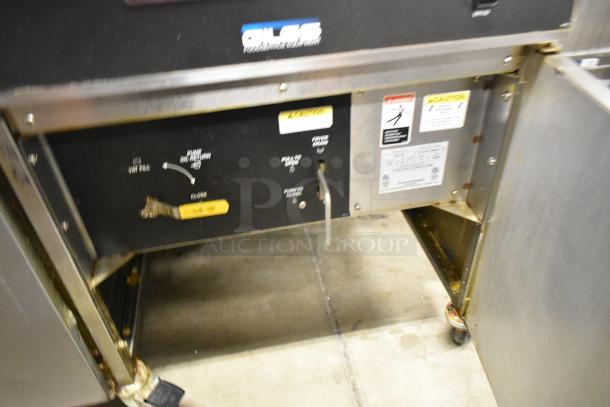 Giles EOF-24 stainless steel commercial deep fat fryer with center dumping station, on casters, 480V, 3 phase.