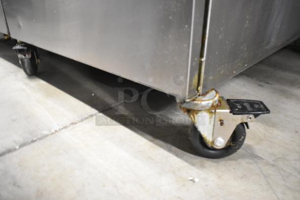 Giles EOF-24 stainless steel commercial deep fat fryer with center dumping station, on caster wheels, 480V, 3-phase.