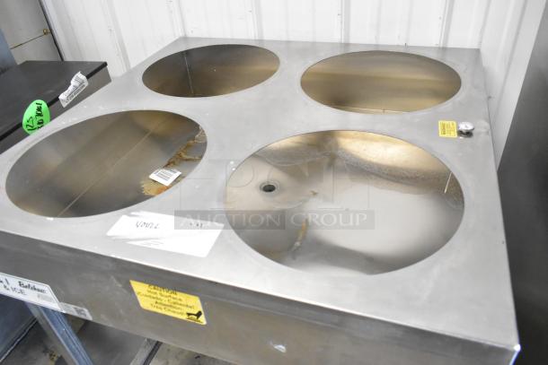 Belshaw Adamatic H&I-4 stainless steel glazing station, 4-bowl, commercial casters, visible wear, 208-240V, 1 phase.
