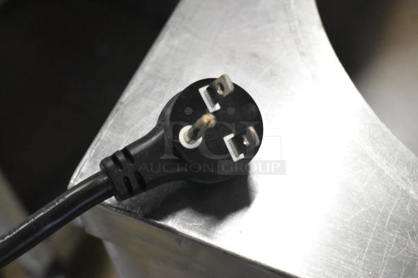 Close-up of a power plug for the Belshaw Adamatic H&I-4 Stainless Steel Glazing Station. 208-240V, 1 Phase.
