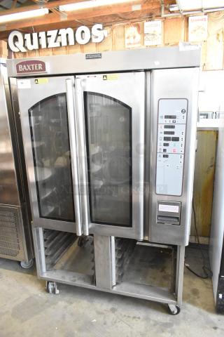 Baxter stainless steel rotating rack oven, natural gas, dual pan rack, commercial casters, control panel, good condition.