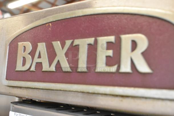 Baxter logo on stainless steel commercial natural gas-powered mini rotating rack oven with dual pan rack; on casters.
