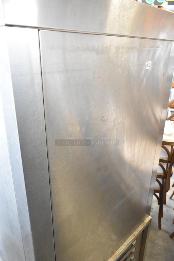 Baxter stainless steel commercial natural gas mini rotating rack oven with dual pan rack on casters, used condition.