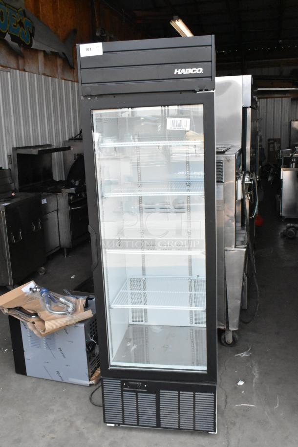 2019 Habco SE18 single door cooler merchandiser with poly coated racks; black exterior, clear glass door showing interior shelves. 115V, 1 phase.