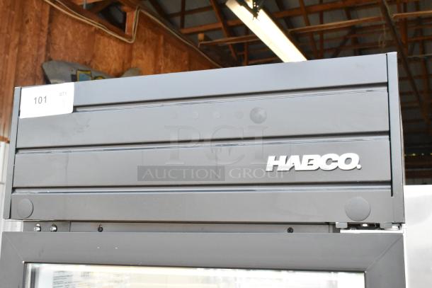 2019 Habco SE18 metal commercial single-door cooler merchandiser with poly-coated racks, 115 volts, 1 phase.