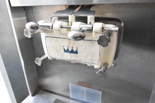 Taylor 754-27 stainless steel soft serve ice cream machine, 2 flavor w/ twist, on commercial casters, 208/230 volts, 1 phase.