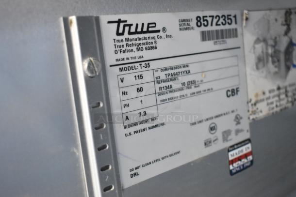 True T-35 cooler label, displaying model, 115 volts, 1 phase, refrigerant R134A, and serial number 8572351 details.