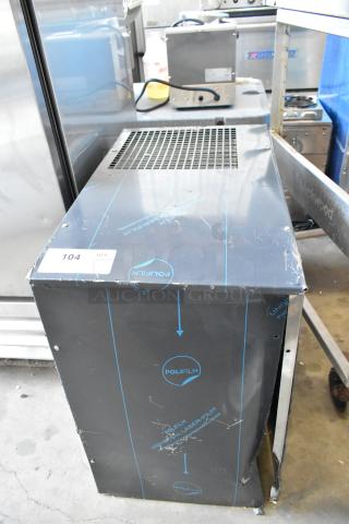 Cornelius WCC700-A stainless steel commercial chunklet ice machine, 115 volts, 1 phase. Protective film intact, slight wear.