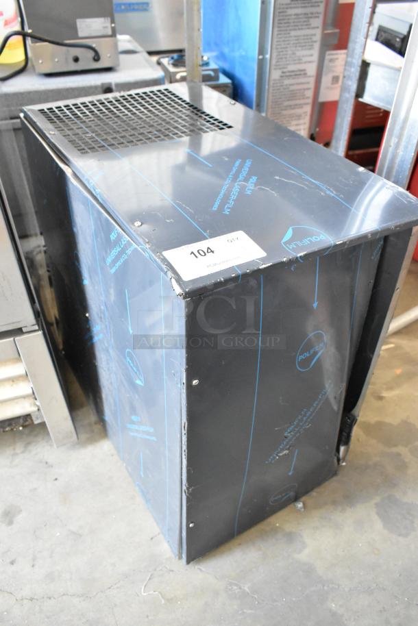 Cornelius WCC700-A stainless steel commercial ice machine, 115 volts, 1 phase. Appears in good condition with protective film and some visible scratches.