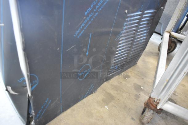 Cornelius WCC700-A stainless steel commercial ice machine side view, protective film visible, 115 volts, 1 phase.