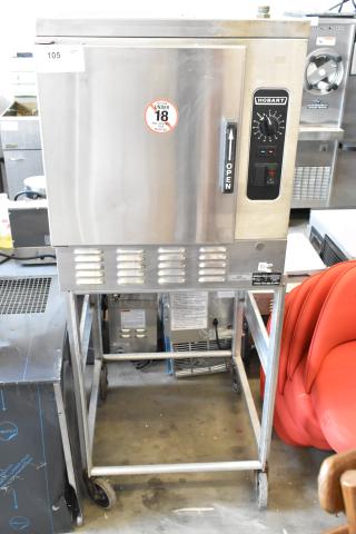 Hobart HC24EA5 stainless steel electric steam cabinet on stand with casters, 208/240V, 3/1 phase, control panel visible.