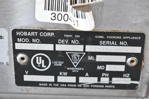 Hobart HC24EA5 commercial steam cabinet label, showing model, serial number, UL certification, and voltage specifications.